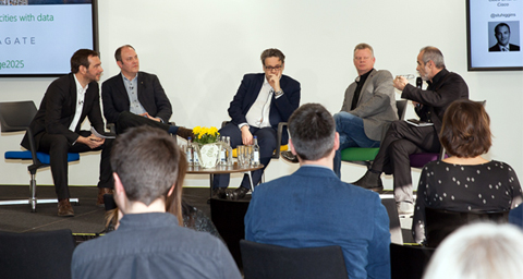 Carlos Moreno, right, speaks at the Smart City panel in London