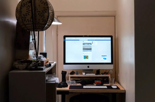 Photographer Simon Pollock workspace setup in a small space