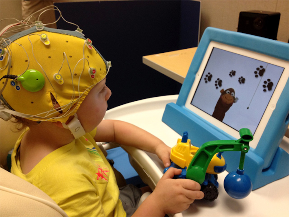 UC Davis researchers record a young child’s brain activity using high-frequency EEG.